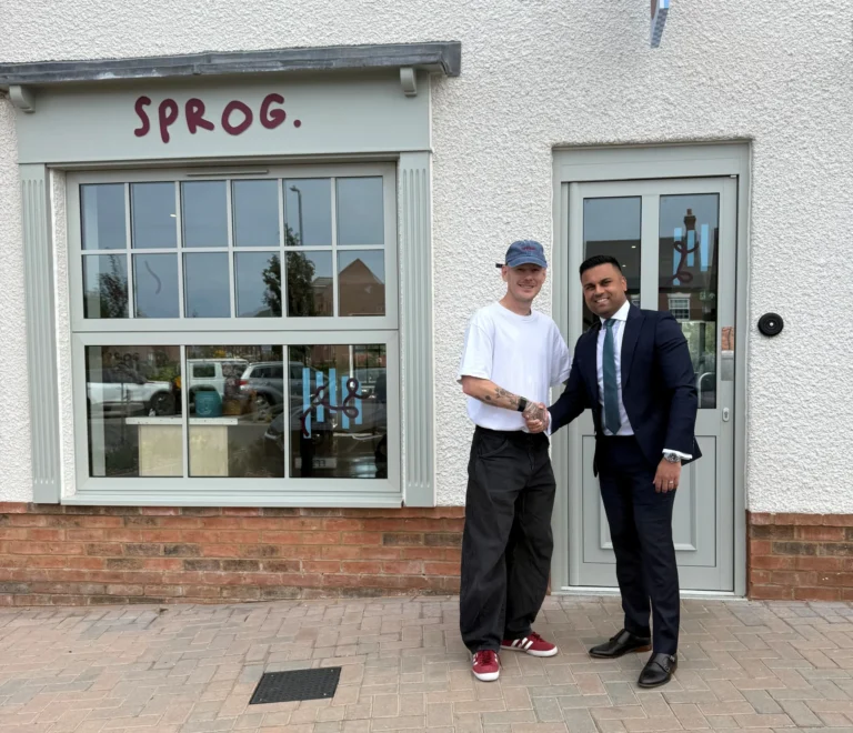 Marneya from Rothera Bray shakes hands with the owner of Sprog play centre